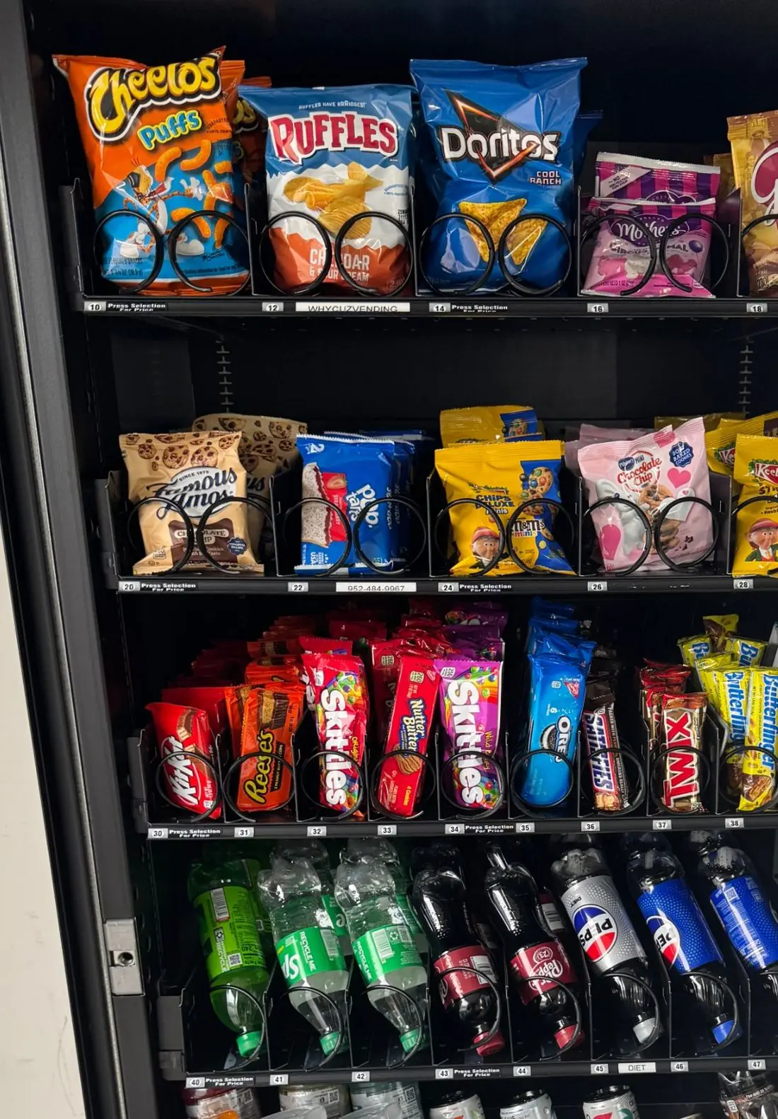 WhyCuz vending machine stocked full of snacks and drinks